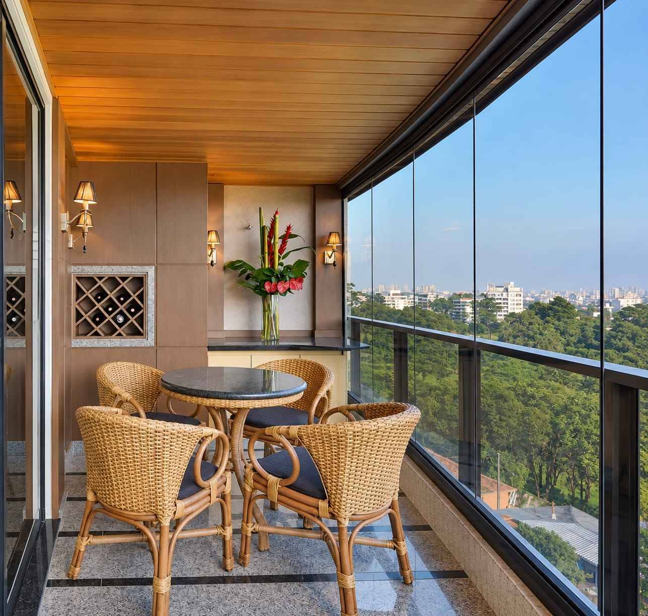 Contemporary Glass Balcony Dining Area with Warm Wooden Storage | Kanchipuram image 2
