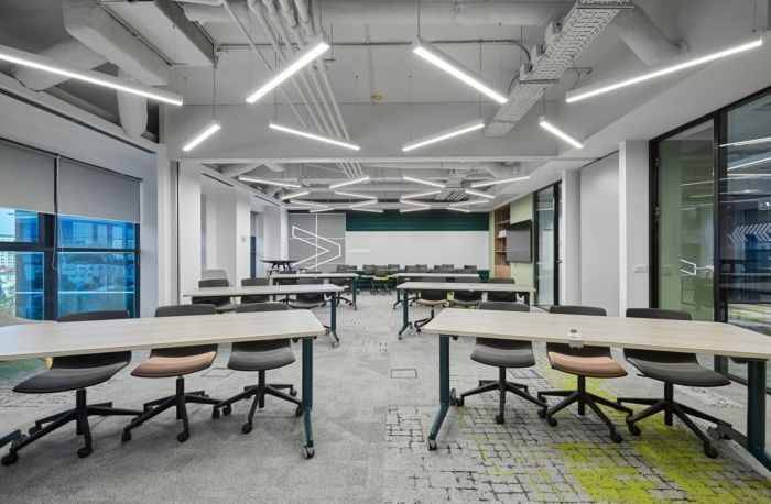 Modern Open Office Interior Design with Hexagon Ceiling Lights – Corporate Workspace Chennai image 3