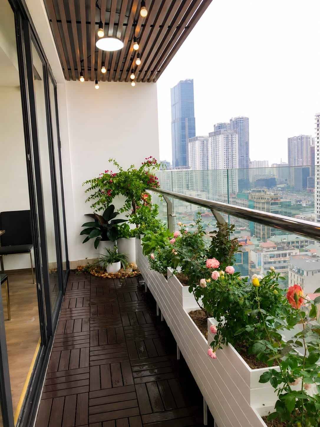 Balcony Garden Design with Raised Planters and Glass Railing | OMR
image 3