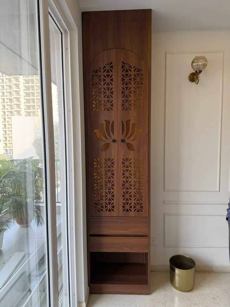Pooja Room Design with Lotus Glass Doors and Wooden Mandir | Adyar image 3