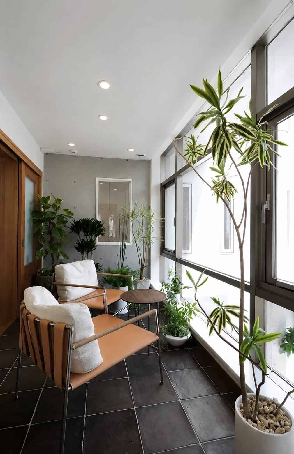 Spacious Balcony Garden Design with Wooden Flooring and Glass Railing | Tambaram image 2
