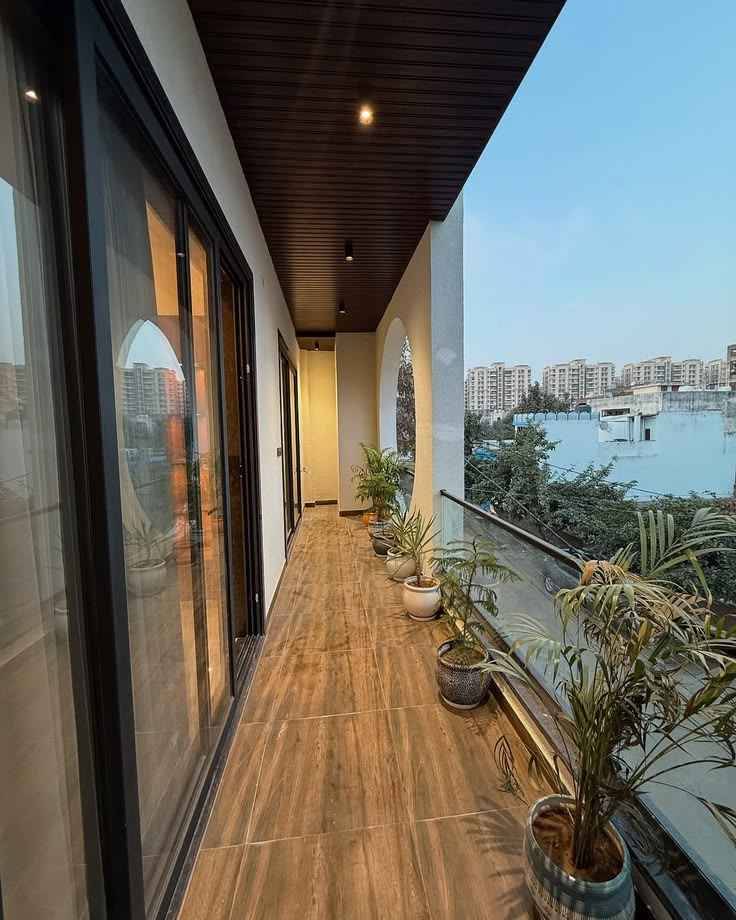 Urban Balcony Escape Wooden Deck Flooring And Panoramic Glass Railing | Anna Nagar  image 3