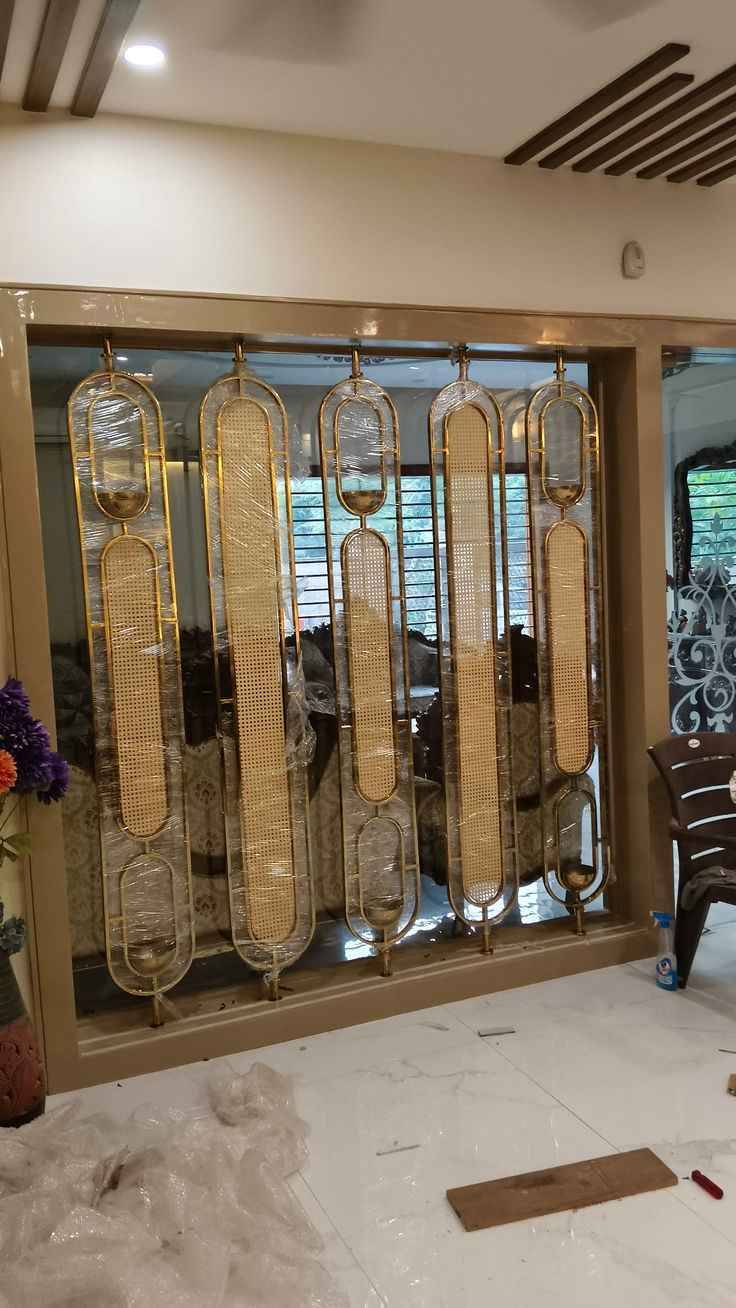 Gold Metal Partition with Cane Panels and Circular Mirror Design | Adyar image 3