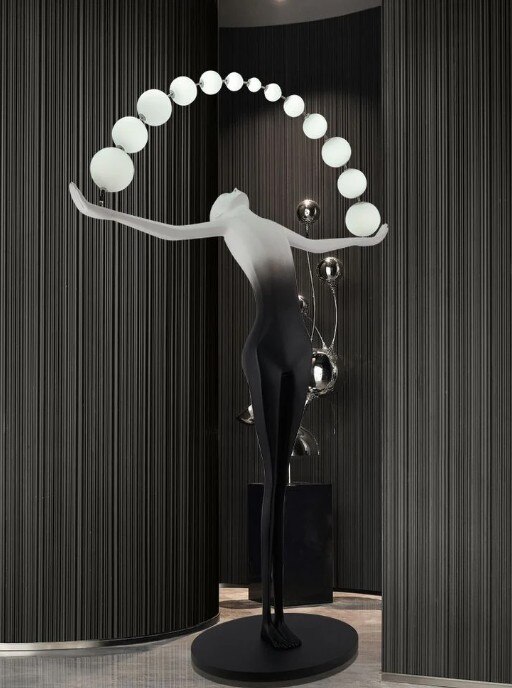 Designer Black White sculpture holding ball floor lamp image 2
